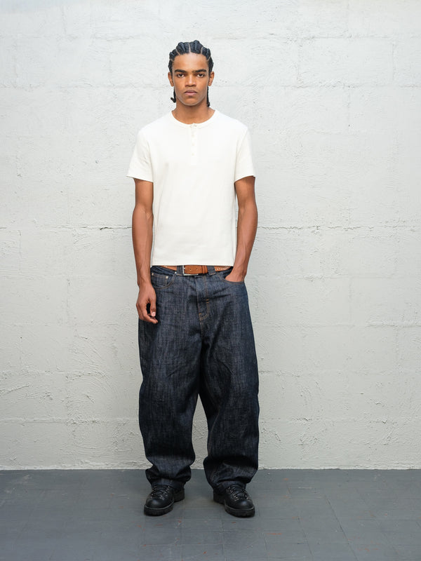 Model wearing white t-shirt and Denim Pant Indigo Selvedge Denim from front