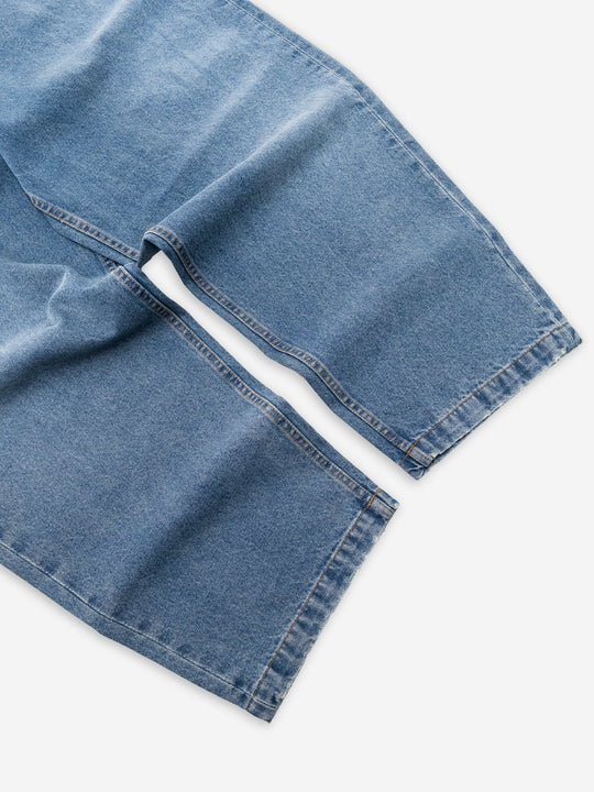 Baggys Denim Pant Fray — hem detail flatlay, light blue wash