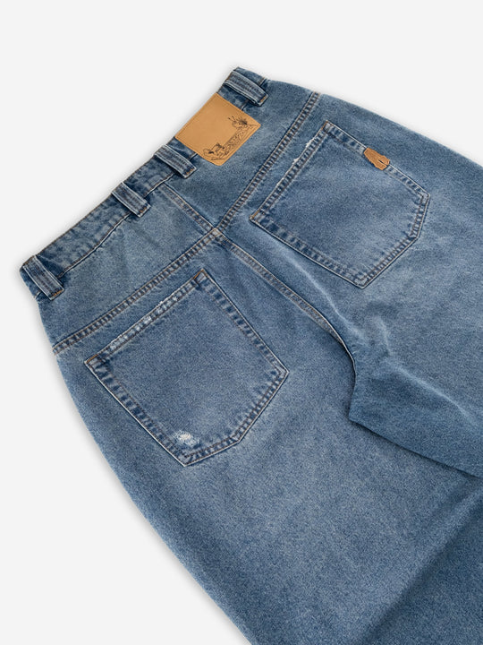 Baggys Denim Pant Fray — rear hem close-up flatlay, light blue wash
