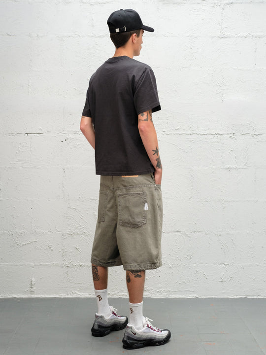 Model wearing Grab Tee faded black with Denim Short | Sage Baggys.uk rear