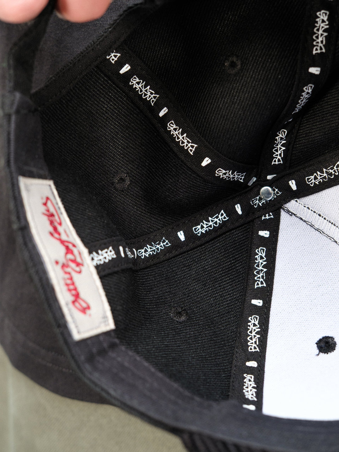 Inside detailing of Baggys 5-panel hat in black up close