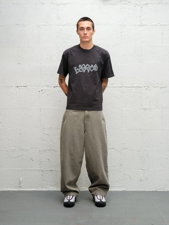 Model wearing Grab tee faded black with DENIM PANT | SAGE 