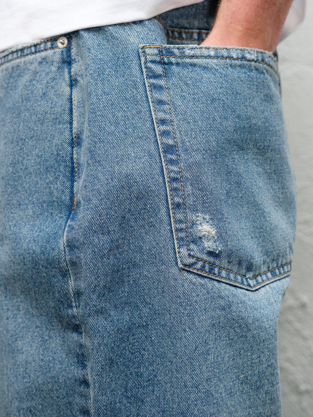 Fray Blue baggy denim pant, close up of the back pocket