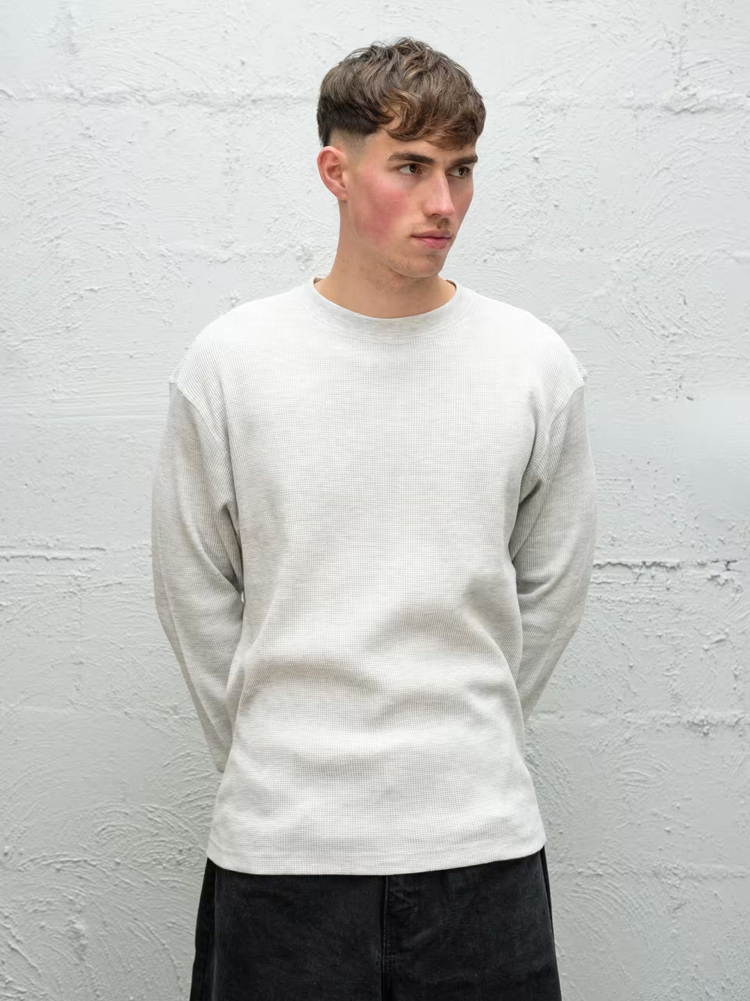 Person wearing waffle long sleeve in smoke grey size medium