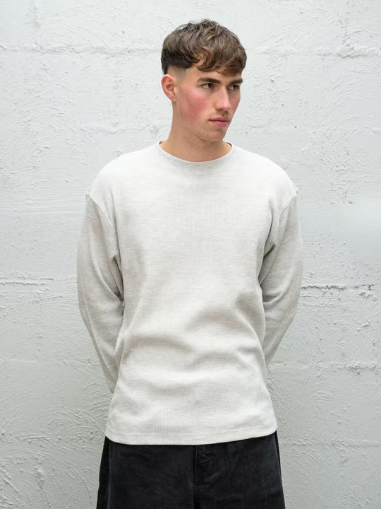 Person wearing waffle long sleeve in smoke grey size medium