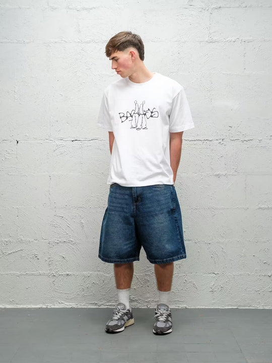 Person wearing blue baggy denim dove jean shorts, made by Baggys.uk