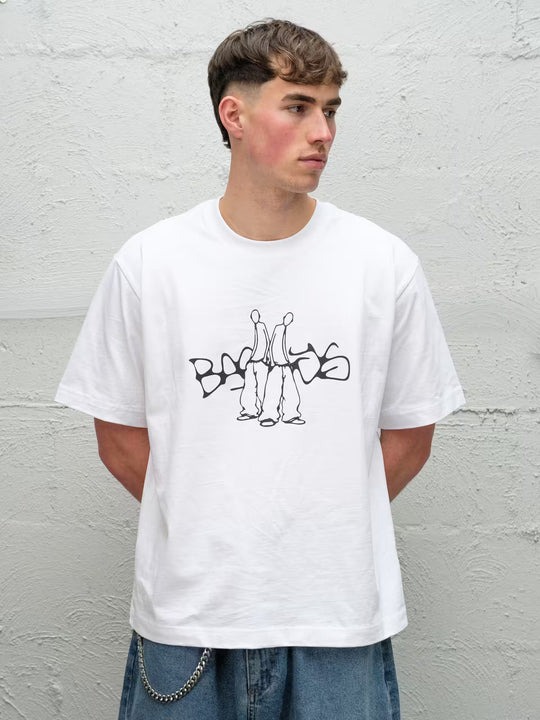 Person wearing white screen printed graphic t-shirt
