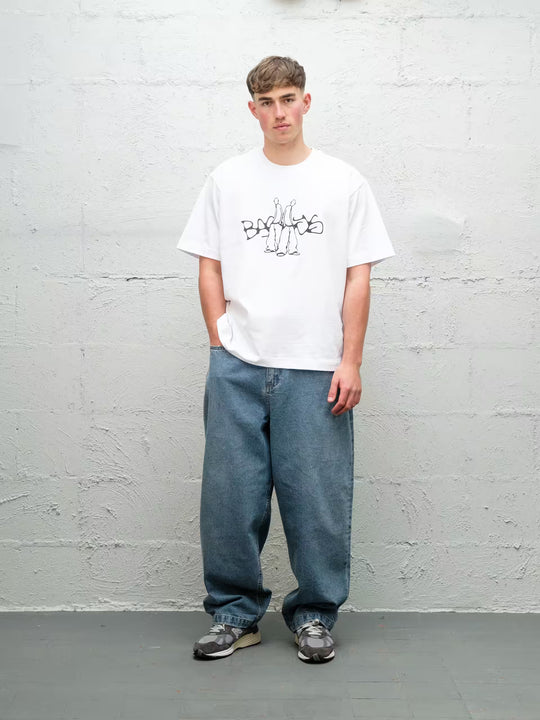 Model wearing Baggys Denim Pant Fray — light blue baggy jeans, front view