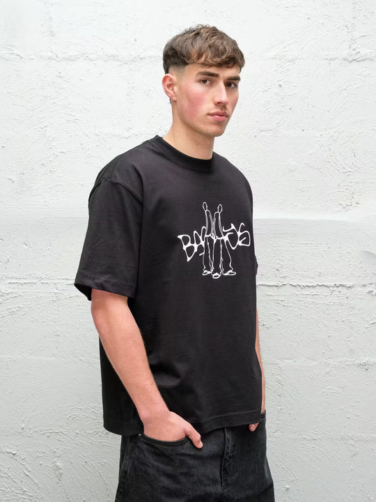 Person wearing black screen printed duo tee