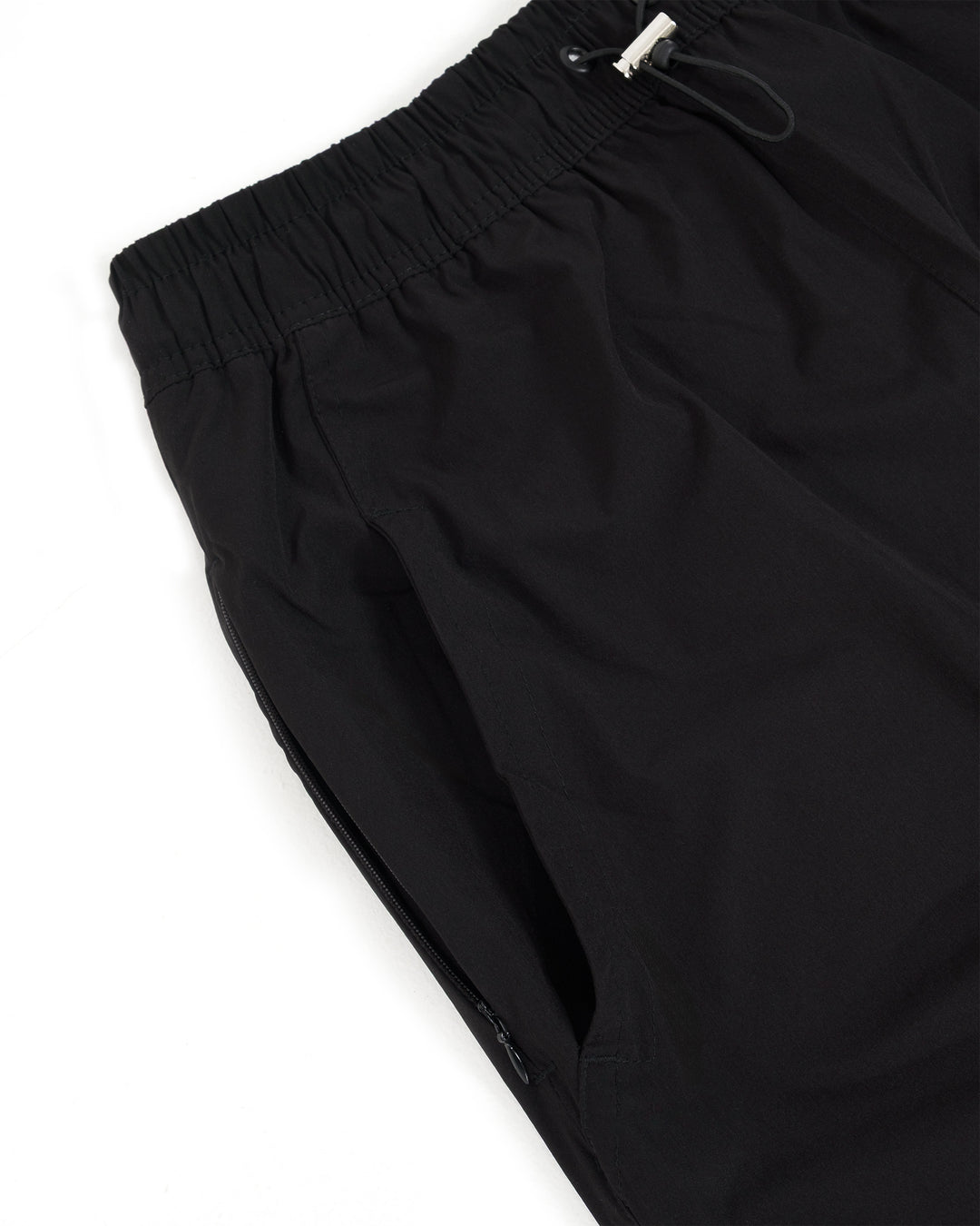 Baggy Vanta Black Track Pants Front Flatlay Close up Pocket 