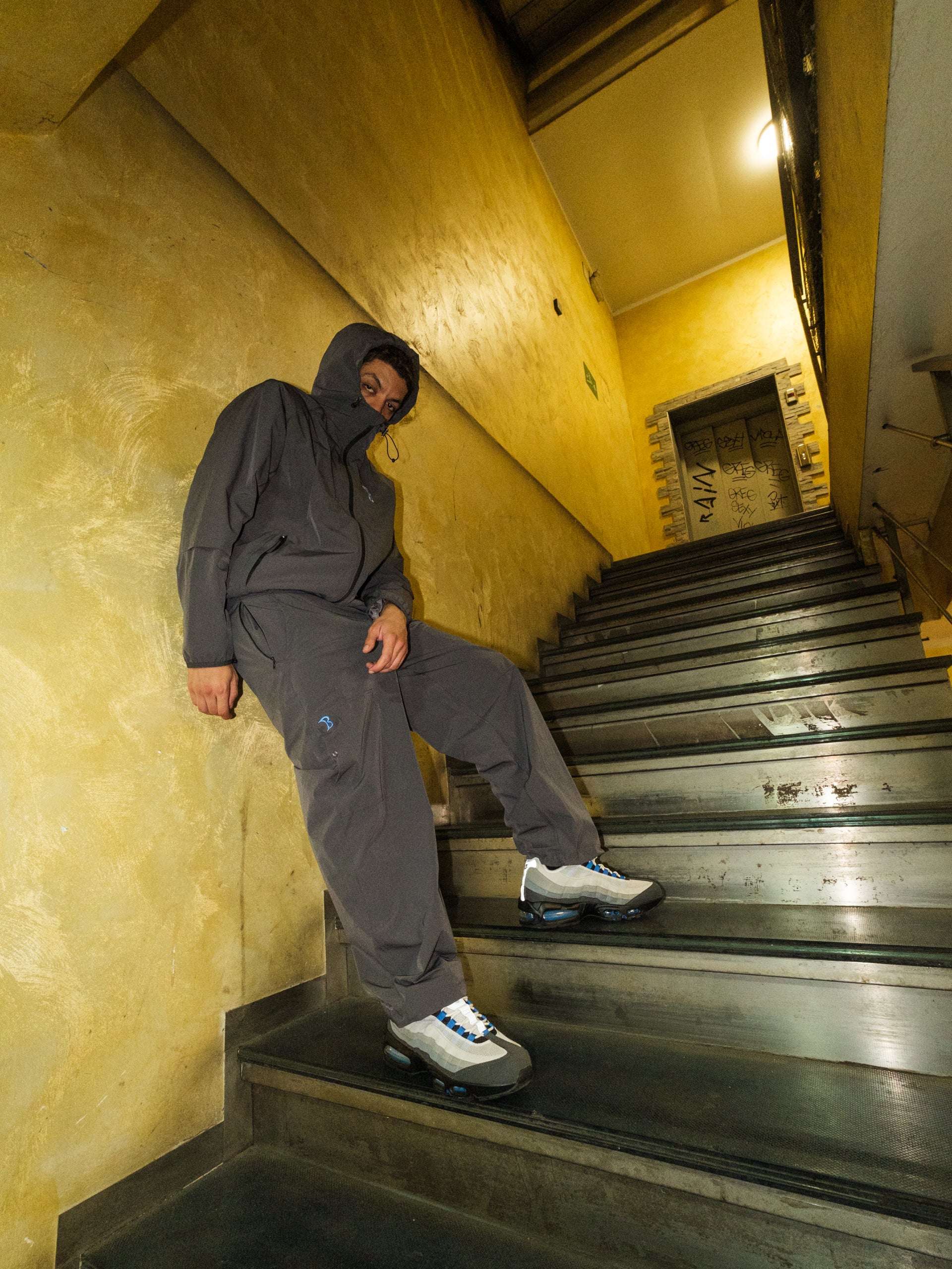 Person wearing Oxide Grey Tracksuit in Milan 