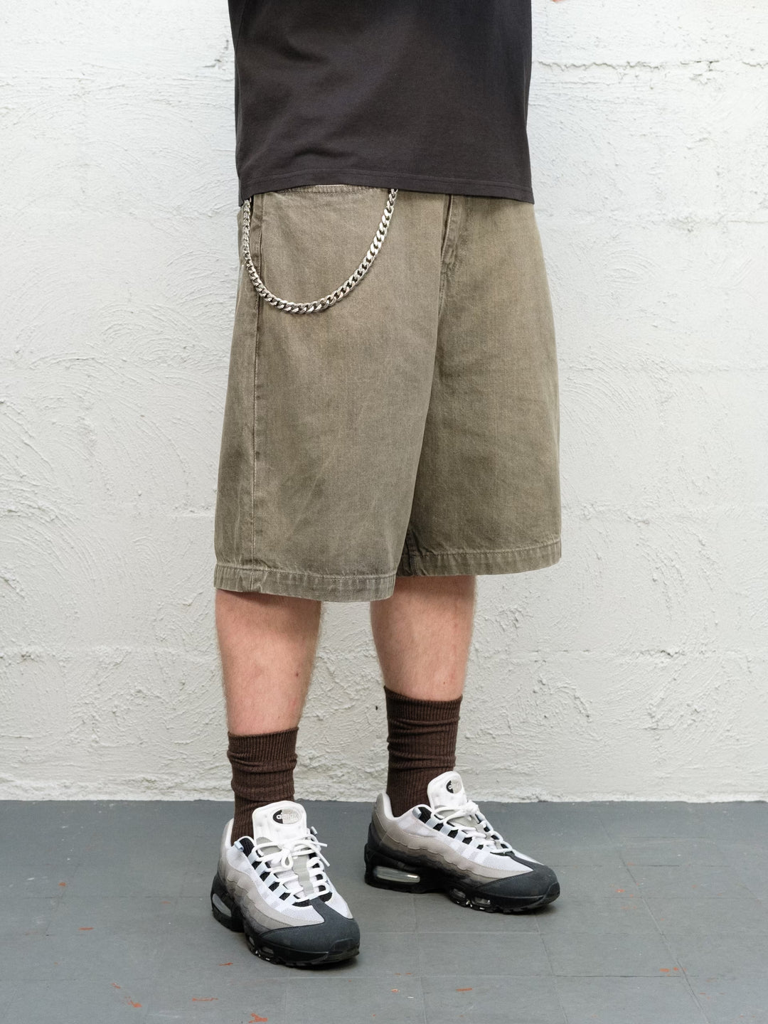 Model wearing Grab Tee faded black with Denim Short | Sage Baggys.uk
