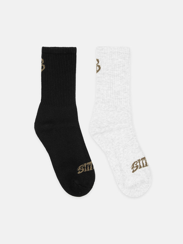 Black and grey marl socks with 'Sittin' branding on a white background
