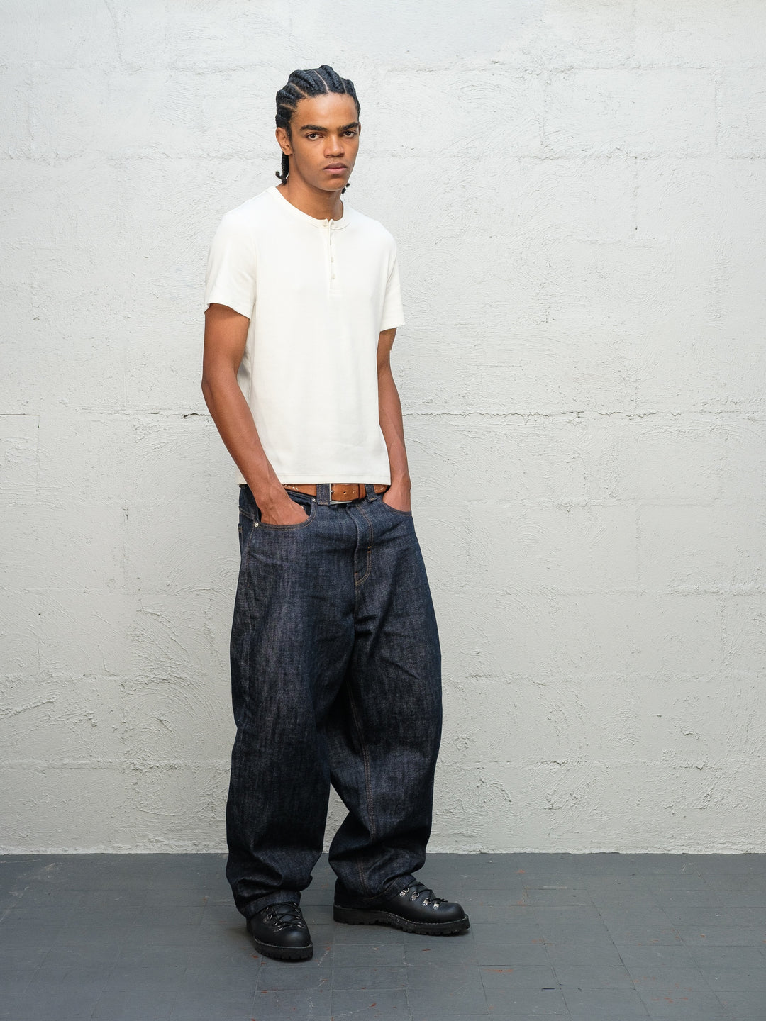Model wearing white t-shirt and Denim Pant Indigo Selvedge Denim from front 