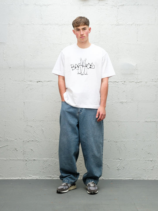 Model wearing Baggys Denim Pant Fray — light blue baggy jeans, front view