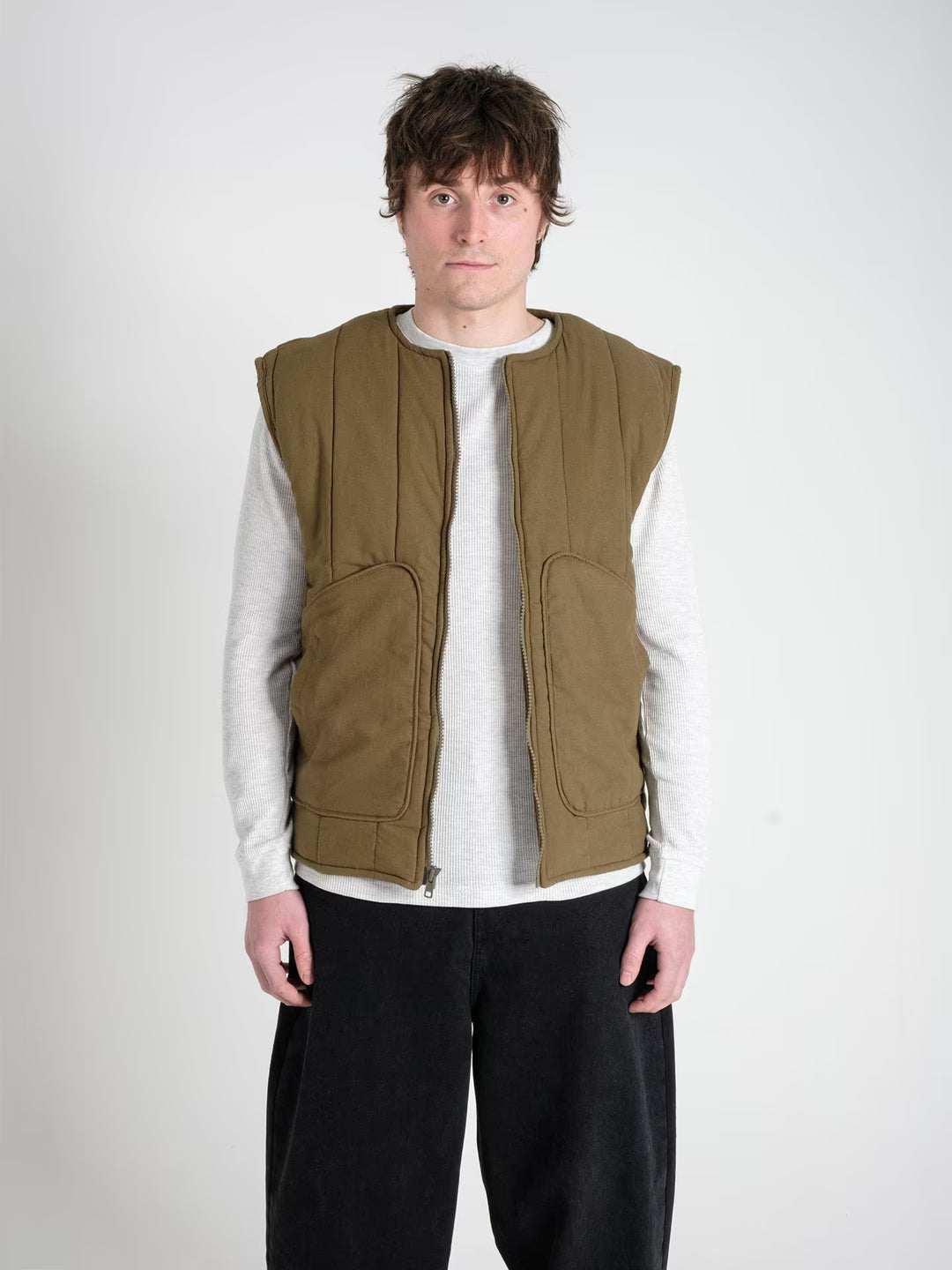 military gilet pine green on body shot front close