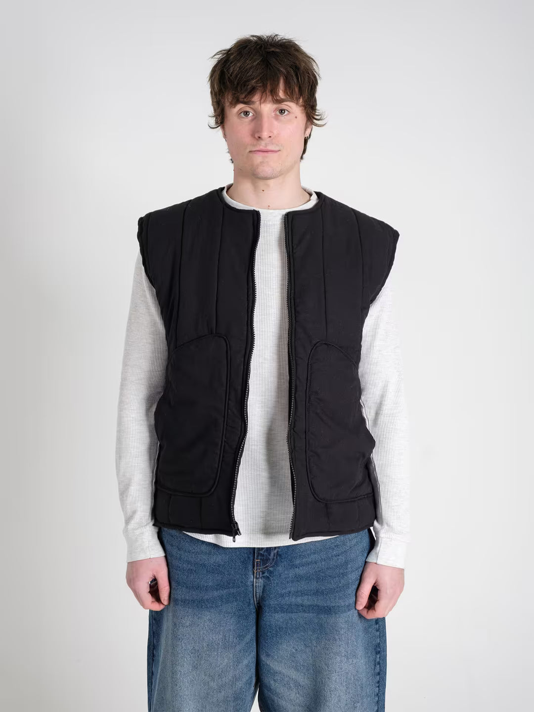 military gilet carbon black on body shot front close