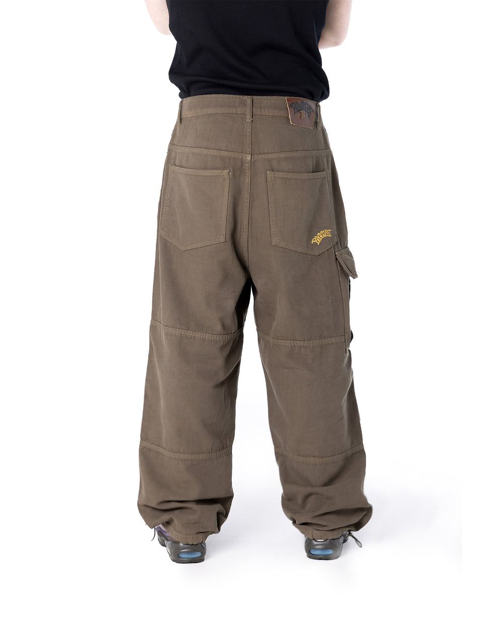 Brown cargo pants with a visible brand logo on a white background