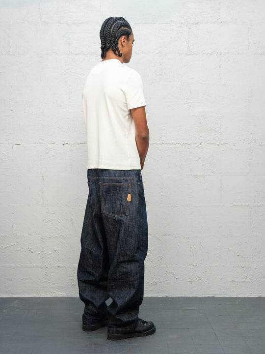 Model wearing white t-shirt and Denim Pant Indigo Selvedge Denim from rear